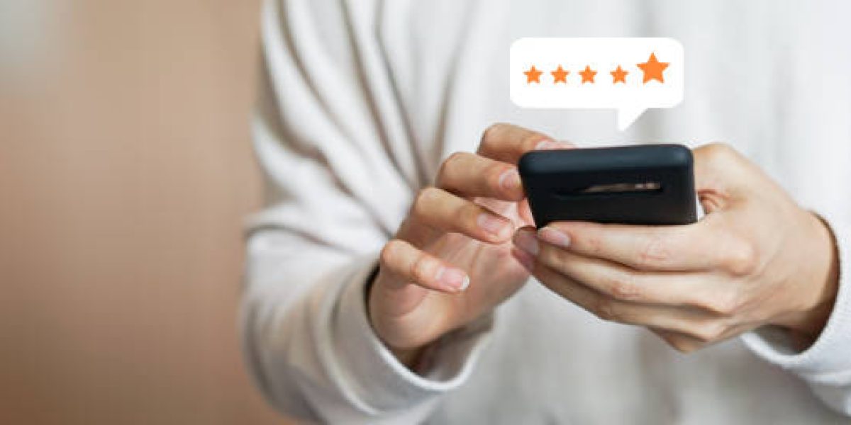 close up on customer man hand pressing on smartphone screen with gold five star rating feedback icon and press level excellent rank for giving best score point to review the service , technology business concept